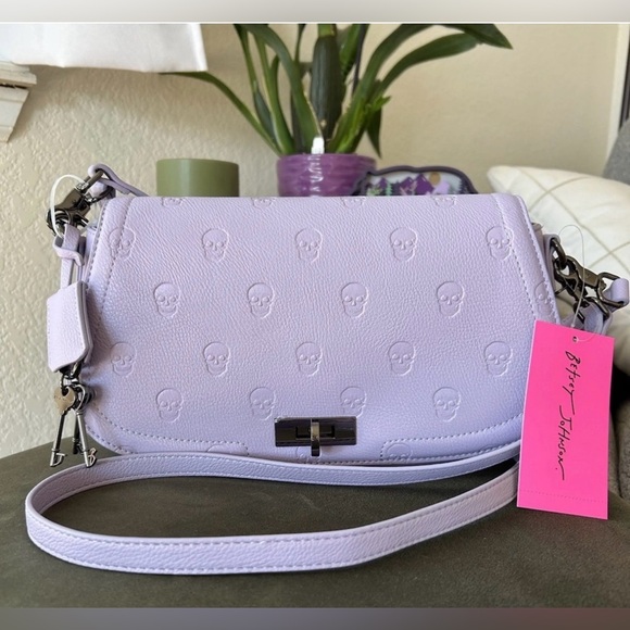 Betsey Johnson Handbags - Betsey Johnson Lavender Embossed Skull Crossbody Purse